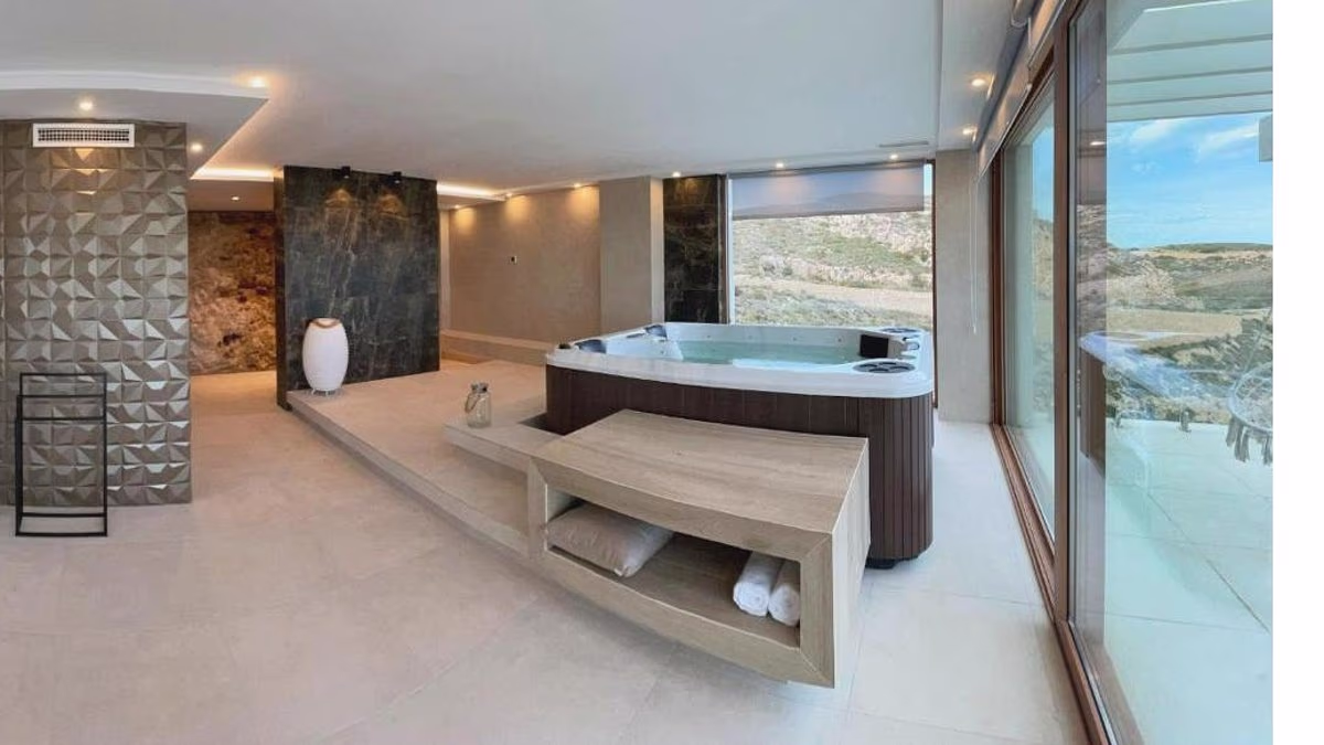 Pictured: Dad and the hot tub he died in alongside his wife in Spain