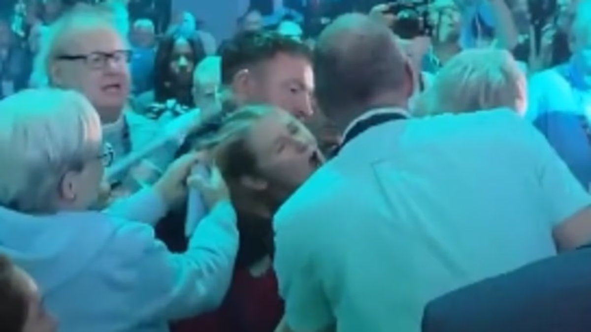 Reform members condemned for manhandling heckler in conference mayhem