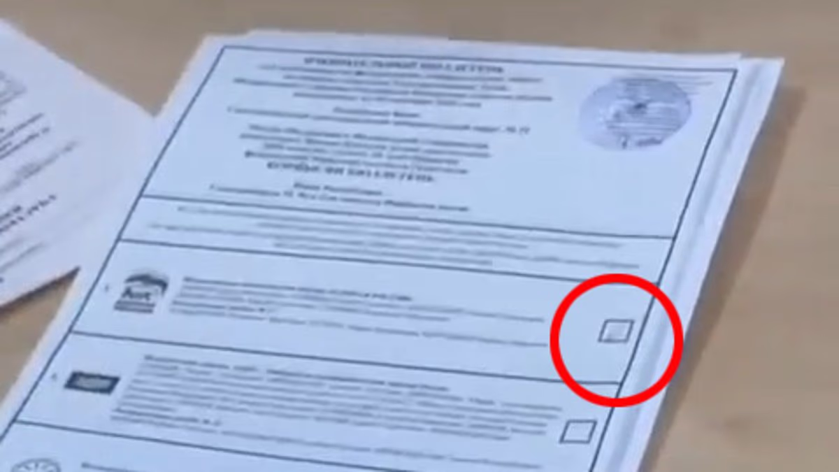 Russian voters handed ballot papers with an X for Putin