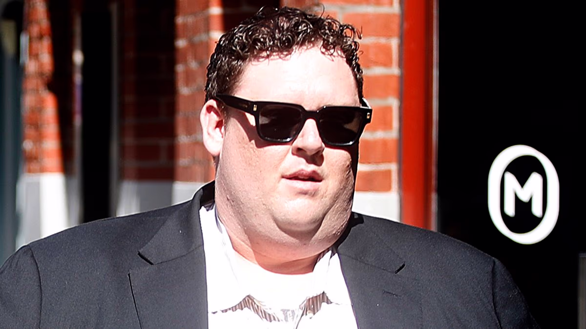 Scholar accused of possessing child abuse material charged with rape