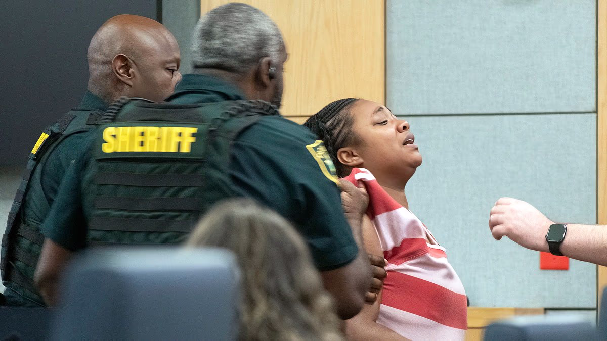 Suspected murderer is dragged out of courtroom kicking and screaming