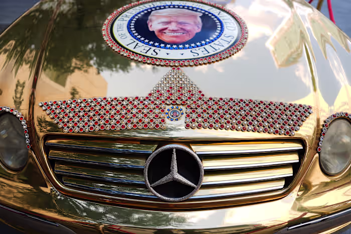 The Latest: Trump gave $45,000 cash to Natalie Harp amid gifts to White House aides