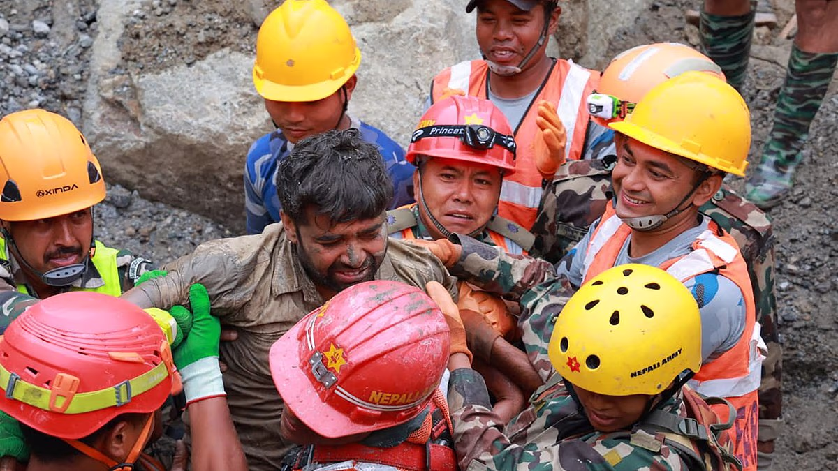 Two workers rescued from tunnel in Nepal nine days after flood
