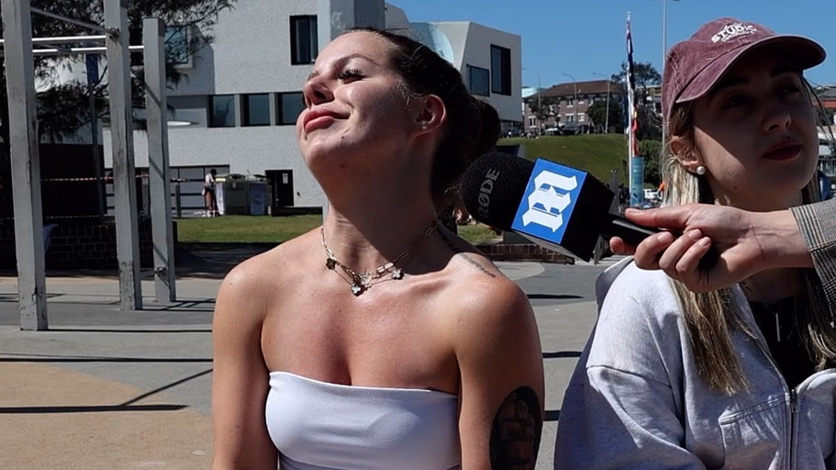Young woman breaks down over Albo's visa changes in tearful interview