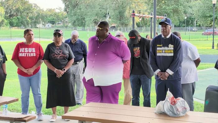 ‘We are not afraid:’ Community gathers for vigil near Sanford mass shooting scene as police search for shooters
