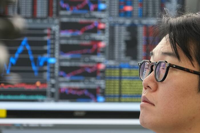 Asian shares and U.S. futures are mixed after Google parent Alphabet's earnings disappoint