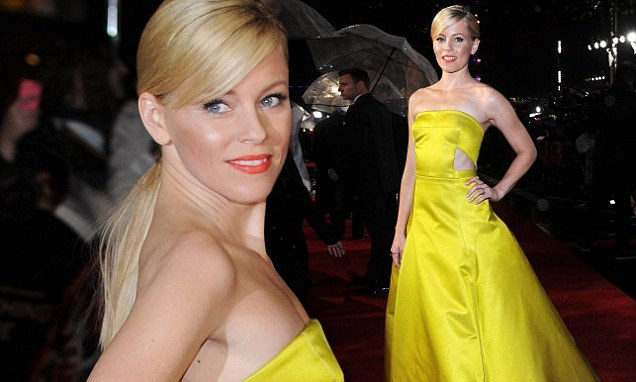 Elizabeth Banks in yellow gown at Hunger Games: Catching Fire premiere