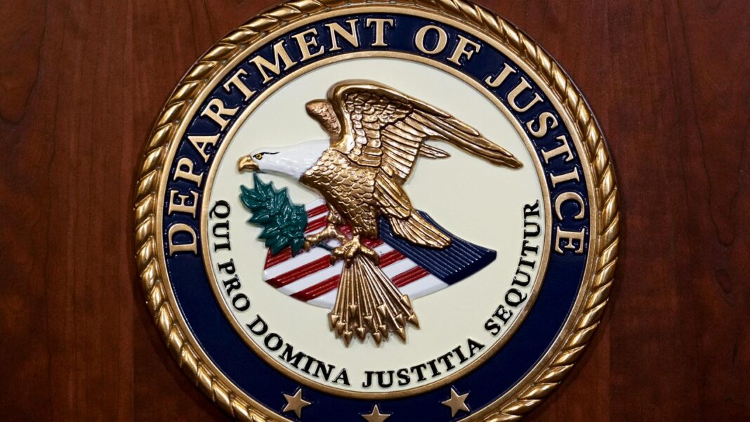 The seal of the Department of Justice, Aug. 1, 2023, at the Department of Justice in Washington. (AP Photo/J. Scott Applewhite, File)