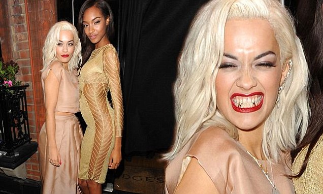 Rita Ora toughens up her look with a grill..