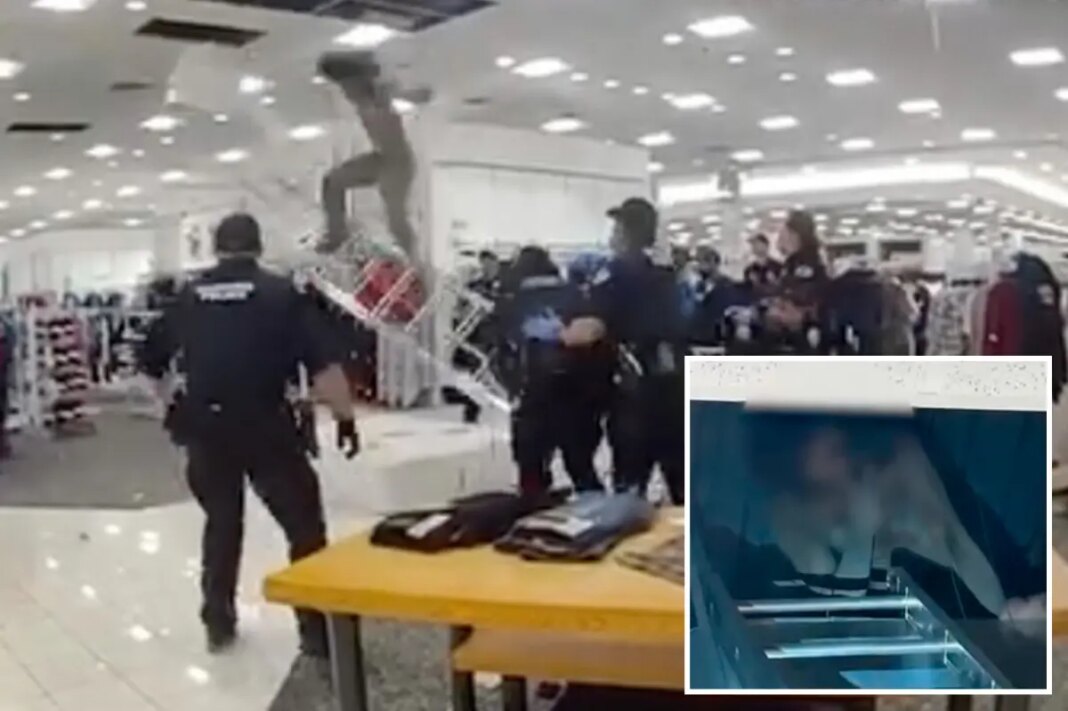 Shirtless burglar hiding in ceiling of Macy's store dramatically falls from overhead space: shocking video