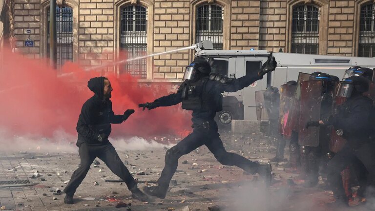 France Protests Turn Violent as Macron Warns Unrest Is Exploited